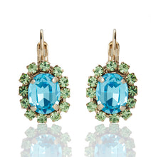 Load image into Gallery viewer, FIRUCCI AQUA &amp; PERIDOT OVAL CRYSTAL SET DROP EARRINGS.
