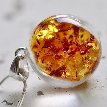 Resin sterling silver necklace with amber